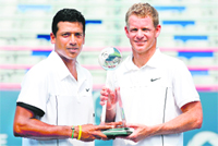 Mahesh Bhupathi and Mark Knowles pose for photographers in Montreal on Sunday.