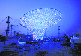 A view shows a lighting test at the "Sun Valley" at the 2010 World Expo site in Shanghai on Monday. The Shanghai Expo, with the theme of "Better City, Better Life", is scheduled to be held from May 1 to October 31, 2010. So far, 191 nations and 48 international organisations have confirmed their participation in the Expo, according to Xinhua News Agency.