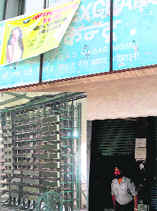 The Phase X exchange of the BSNL that is being shifted to Phase XI in a haphazard manner; and (inset) a part of the ill-equipped Phase XI exchange.