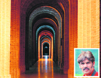The corridor of Forest Research Institute in Dehradun clicked by Bhumesh Bharati (inset).