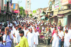 Traders take out a protest march in the bazars of Fazilka on Tuesday.