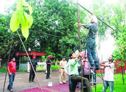 Students erect tents in Panjab University on Wednesday. 