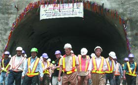 DMRC managing director E. Sreedharan with officials coming out from Indias longest tunnel built by New Austrian Tunnelling Method (NATM) in New Delhi