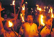 Local people take out a torch rally in support of the setting up of the central university in Jammu 