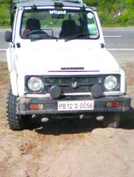 A police Gypsy that is being used to ferry labourers from Chandigarh to the house for renovation