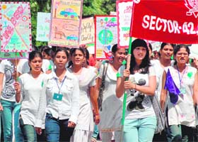Students of Government College, Sector 42, take part in a rally to celebrate Urja Diwas in Chandigarh