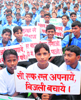 Schoolchildren at a programme organised to celebrate Akshay Urja Diwas in Karnal on Thursday. 