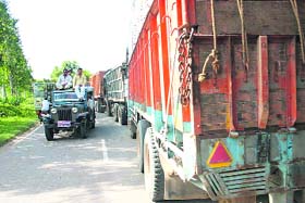 Trucks parked on the Katcha Beri Road