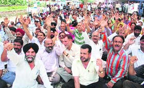 Government employees protest in Jammu on Thursday, seeking the implementation of the Sixth Pay Commission recommendations