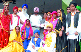 The students of Red Cross School for Deaf, who participated in the Independence Day function at Guru Gobind Singh Stadium in Jalandhar, receive a cash award of Rs 2 lakh on the occasion.