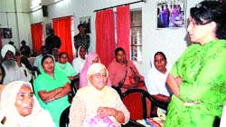 Suchita Pama, Convener FWO 15 Infantry Division, interacts with family members of martyrs and ex-servicemen.