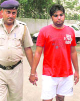 Ashish Buteja being taken for medical examination in Chandigarh on Friday.