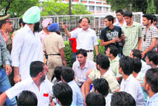 PUSU leaders argue with Vice-Chanceller RC Sobti outside his office at Panjab University, Chandigarh on Friday.