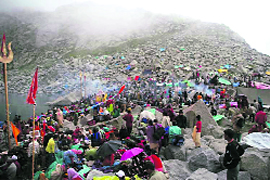 Devotees worship at Kailash Kund.