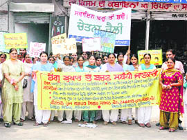 Students of GMT College hold a rally in Ludhiana on Friday. 