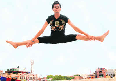 During his dance practice, Salim soars above the terrace at the shelter