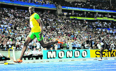 Jamaicas Usain Bolt crosses the finish line in Berlin on Thursday.