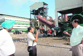Chandigarh Pollution Control Board employee monitoring the garbage processing plant on Saturday. 
