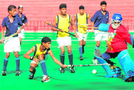 Players in action during the first match of SN Vohra Sub-Junior Hockey Tournament, being played at Sector 42 Hockey Stadium in Chandigarh on Saturday.