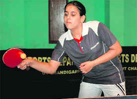 A participant plays a shot in the RS Mehta Memorial Invitational Table Tennis Tournament in Chandigarh on Saturday.