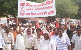 Employees of the Gurgaon Municipal Corporation demonstrate for their demands
