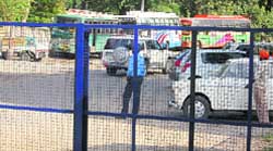 Private buses parked on the road leading to Guru Nanak Bhawan despite installation of gates.