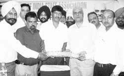 Office-bearers of the SBISA present a bouquet to ON Bindru at Ludhiana 