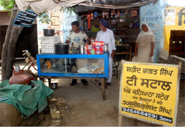 A small tea stall and provision store owner running his shop in the name of Shaheed Bhagat Singh in Bathinda.