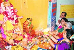 Members of Maharashtra Mandal performing puja on the first day of Ganpati Utsav at Sector 19, Chandigarh, on Sunday.