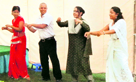 Participants perform at the opening ceremony of Latika Roy Foundations Early Intervention Centre.