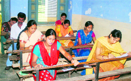 Candidates take the entrance exam in Haridwar on Sunday.