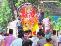 An idol of Lord Ganesha being taken for installation in the Donga Bazar area at Kangra on Sunday.
