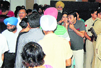 Punjabi artist Bhagwant Mann tries to gain entry at Guru Nanak Dev Bhawan for a play in Ludhiana on Saturday evening.