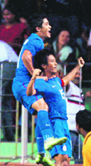 Indian skipper Baichung Bhutia celebrates with Sunil Chetri after his goal against Kyrgyzstan during the Nehru Cup Football Tournament at Ambedkar Stadium in New Delhi on Sunday. This was Bhutias 100th match as India won 2-1. 
