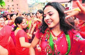 Nepalese women pay homage to Shiva as they celebrate the Teej festival in Kathmandu