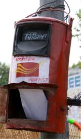An open letter box near Rose Garden in Bathinda presenting a sorry state of affairs at the Department of Posts. 