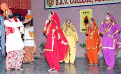The artistes of Rangla group performing folk dance during a cultural function at the DAV College in Abohar 