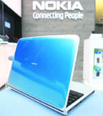 Nokia's new netbook computer, the Booklet 3G, is seen at Nokia corporate headquarters in Helsinki on Monday. The world's top cellphone maker Nokia said on Monday it would start to make laptops, entering a fiercely competitive, but fast-growing market. 