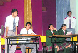 Participants at a debate contest held at St. Josephs School in Dehradun on Monday. 