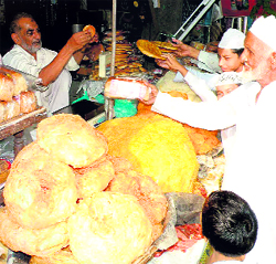 Offer prayers during the Ganesh Mahotsav in Haridwar on Monday.