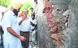 Senior town planner BS Brar reasons it out with councillor Tanveer Singh Dhaliwal in Ludhiana