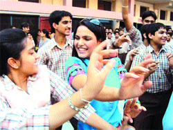 Actress Roshni dances with students of a private school in Amritsar.