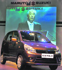 Maruti Suzuki India CEO Shinzo Nakanishi (on screen) at the launch of new Estilo in New Delhi on Tuesday.