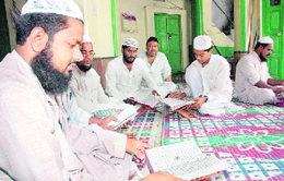 Muslims recite the Quran during the holy month of Ramzan at Jama Masjid, Dehradun, on Tuesday.
