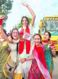 Anu Kumari of Hamirpur College celebrates after her election as president of the SCA