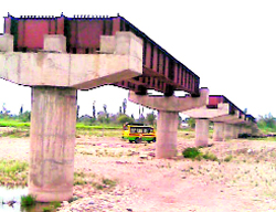 The unfinished bridge over the Baagh nullah in Kathua district.
