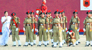 A doctor rushes to the help of exhausted women constables of the BSF at their passing out parade at Kharkan Camp in Hoshiarpur on Tuesday.