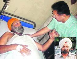 GRP official Naranjan Singh recuperates at the CMCH; and (inset) SI Surinderjit Singh who helped nab a terrorist at the railway station in Ludhiana on Tuesday.