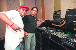 Tune in: Dj Bhanu (R) with his student