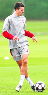 Arsenals Robin Van Perise practices on the eve of their Champions League qualifier match against Celtic in London on Tuesday. 